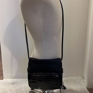 Cross body Clark’s hand bag.